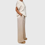 Amaya – Spring set with a light blouse and wide pants